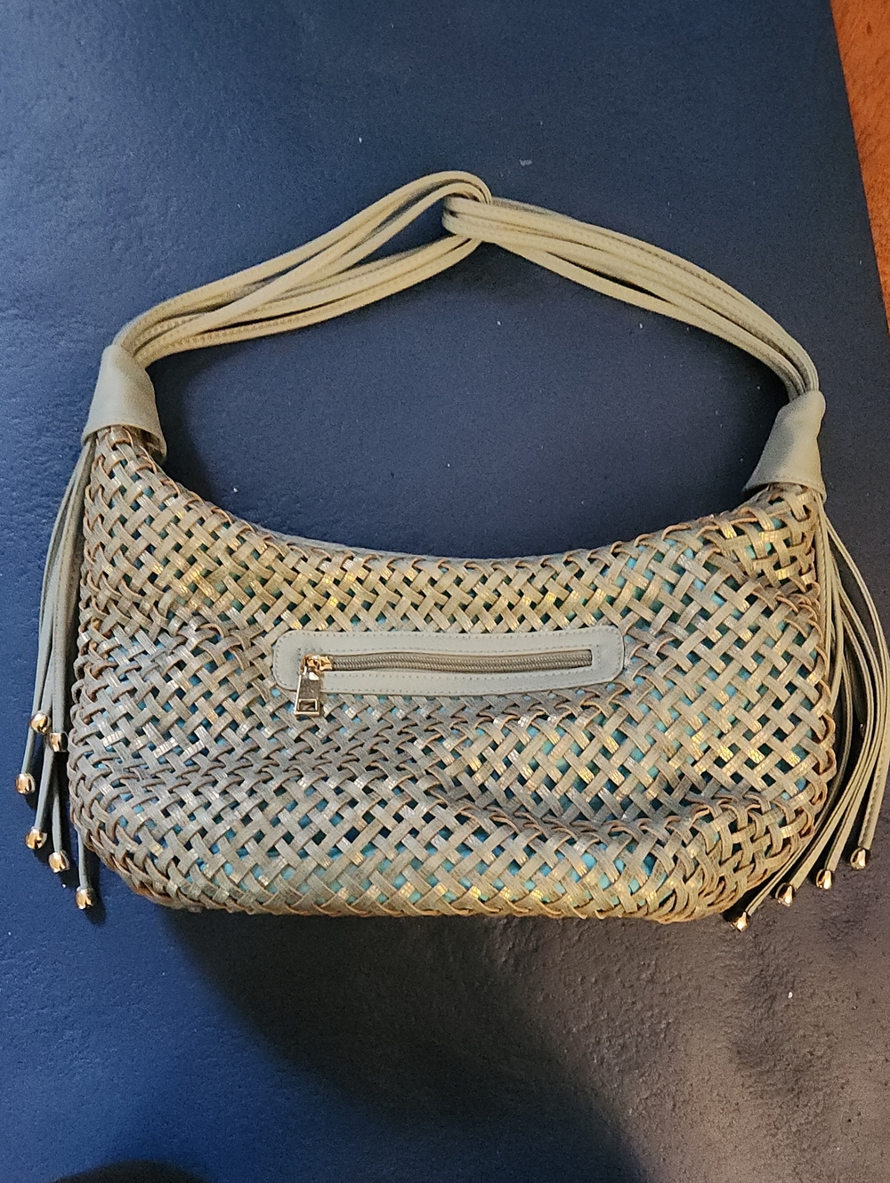 Woven Shoulder Hobo Bag in Light Blue With Golden Sheen.